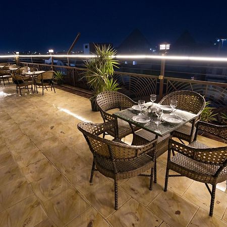 Pyramids Gem Plaza Hotel Kafrat al Jabal Exterior photo